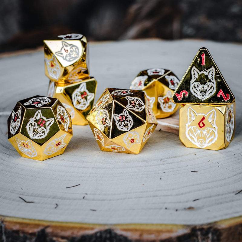 Load image into Gallery viewer, Wolves&#39; Den Red, White, and Gold Metal Dice Set
