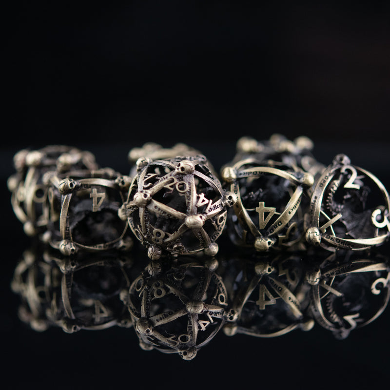 Load image into Gallery viewer, Draco Immortui Hollow Metal Dice Set - Champagne Gold

