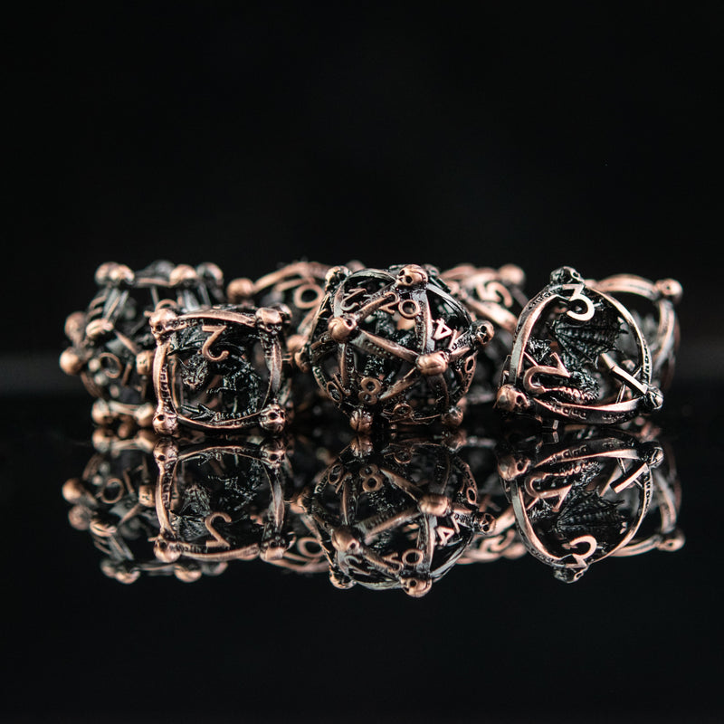 Load image into Gallery viewer, Draco Immortui Hollow Metal Dice Set - Bronze
