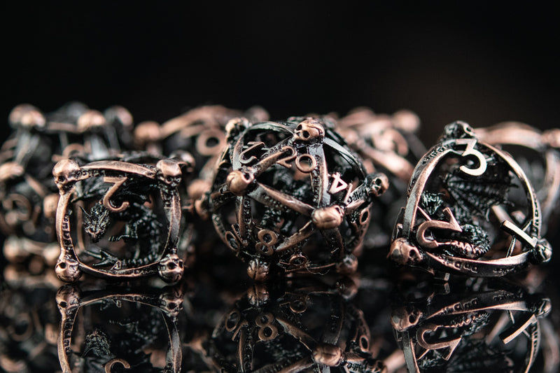 Load image into Gallery viewer, Draco Immortui Hollow Metal Dice Set - Bronze
