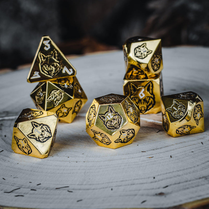 Load image into Gallery viewer, Wolves&#39; Den White, Black, and Gold Metal Dice Set
