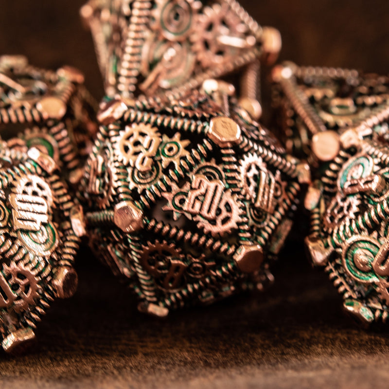 Load image into Gallery viewer, Weird West Wasteland Hollow Metal Dice Set - Green and Bronze
